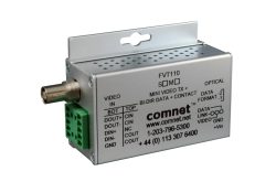 Ein Metallgehäuse eines Comnet FVT110 Mini Video Transmitters mit verschiedenen Anschlüssen und Beschriftungen.