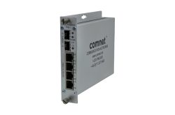 Ein Netzwerk-Switch von Comnet mit mehreren Ethernet-Ports und silbernem Gehäuse.