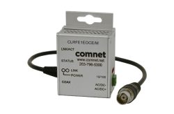 Ein ComNet-Gerät mit der Bezeichnung CLRFE1EOCE/M, einem Coax-Anschlusskabel und Statusanzeigen.