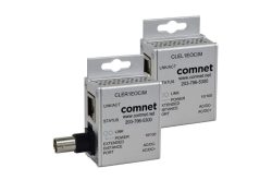 Zwei silberne Geräte von Comnet zur Netzwerkverbindung mit mehreren Anschlüssen und Statusanzeigen.