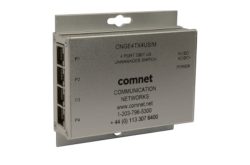 Ein silberner Netzwerk-Switch von Comnet mit vier Ethernet-Ports an der Seite und einer Beschriftung, die das Modell CNGE4TX4US/M und Kontaktinformationen zeigt.