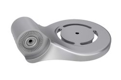Ein silbernes, mechanisches Bauteil mit einer runden Grundform und einer geriffelten, zylinderförmigen Struktur.