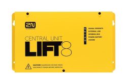 Gelbe zentrale Einheit mit der Aufschrift "2N Telecommunications Central Unit LIFT8" und Warnhinweis zu gefährlicher Spannung. Anzeigen für Signalstärke, externe Linie, internen Bus, Strom/Batterie und System.