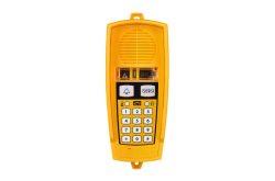 Gelbes Wandtelefon mit Lautsprecher und Tastenfeld.