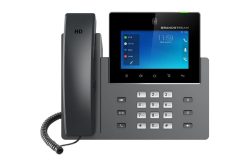 Ein modernes Tischtelefon von Grandstream mit einem digitalen Bildschirm und Tastenfeld.