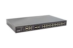 Ein Netzwerk-Switch der Marke ComNet mit mehreren Ethernet-Ports.