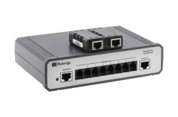 Ein PoLRE LPC Unmanaged Switch von Phybridge mit mehreren Ethernet-Anschlüssen und zwei zusätzlichen Geräten oben.