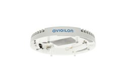 Ein rundes, weißes Gerät mit der Aufschrift "Avigilon", das vermutlich zur Überwachungstechnik gehört.