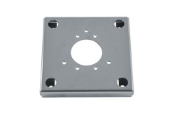 Metallplatte mit mehreren kreisförmigen Löchern in der Mitte und an den Ecken.