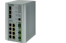 Netzwerk-Switch mit mehreren Ethernet-Anschlüssen und Status-LEDs, grünen Anschlussklemmen an der Seite.