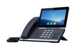 Ein modernes Tischtelefon mit großem Farbbildschirm und Tastenfeld.