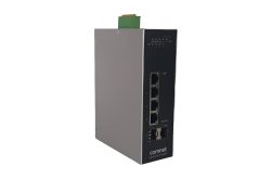 Industrieller Netzwerk-Switch von ComNet mit mehreren Ethernet-Ports und einem SFP-Steckplatz, grau-schwarzes Gehäuse mit grüner Steckverbindung an der Oberseite.
