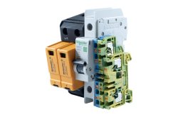Sicherheitsvorrichtung mit mehreren elektrisch verbundenen Komponenten, darunter ein Schalter und farbige Klemmen.