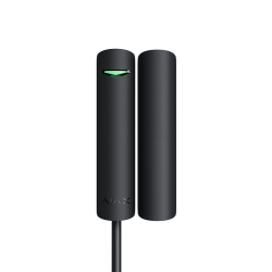 Ein schwarzer zylindrischer Sensor mit grünem Lämpchen und Kabelanschluss, auf weißem Hintergrund.