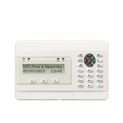 Ein weißes Sicherheitspanel mit einem Display, auf dem "UTC Fire & Security" und ein Datum angezeigt werden, sowie einer numerischen Tastatur auf der rechten Seite.