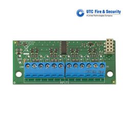 Elektronikplatine mit blauer Klemmleiste und Beschriftung 'INPUTS', mit dem Logo von UTC Fire & Security in der oberen rechten Ecke.