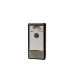 Ein rechteckiges, graues Testgerät mit der Aufschrift 'TESTER' auf der Oberseite, einem großen Knopf in der Mitte und den Beschriftungen 'Active' und 'Battery' daneben.