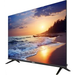 Ein Flachbildfernseher mit einer Darstellung eines Sonnenuntergangs am Meer mit Wellen, die am Strand brechen.